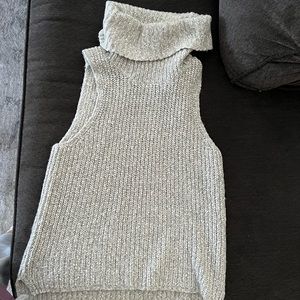 Grey sleeveless turtleneck